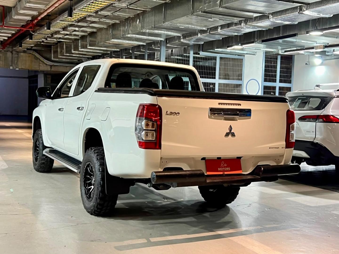Mitsubishi L200 — foto 6 de 21